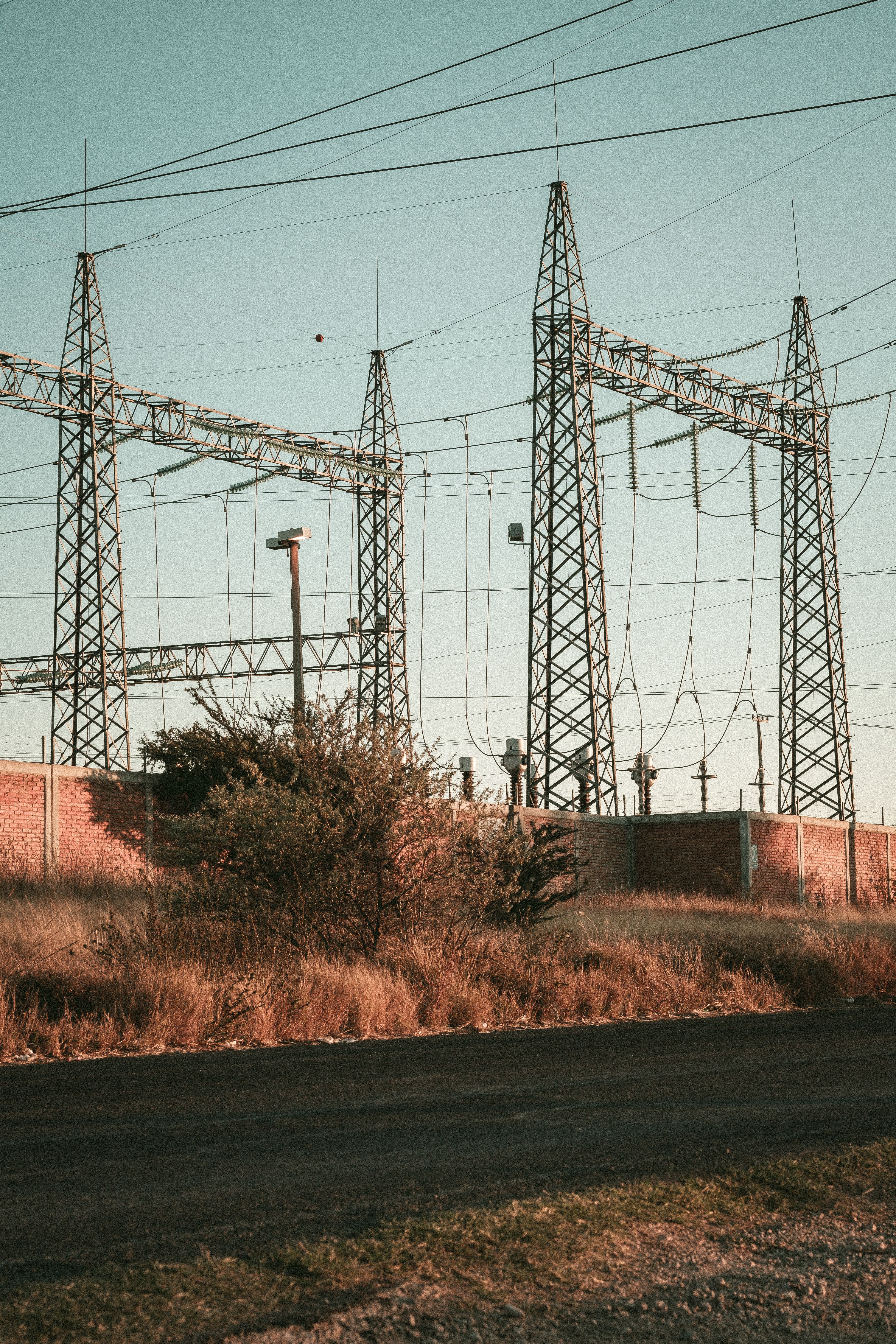 High-voltage transmission towers and cabling, representative of the infrastructure Meerkat protects against extraction.